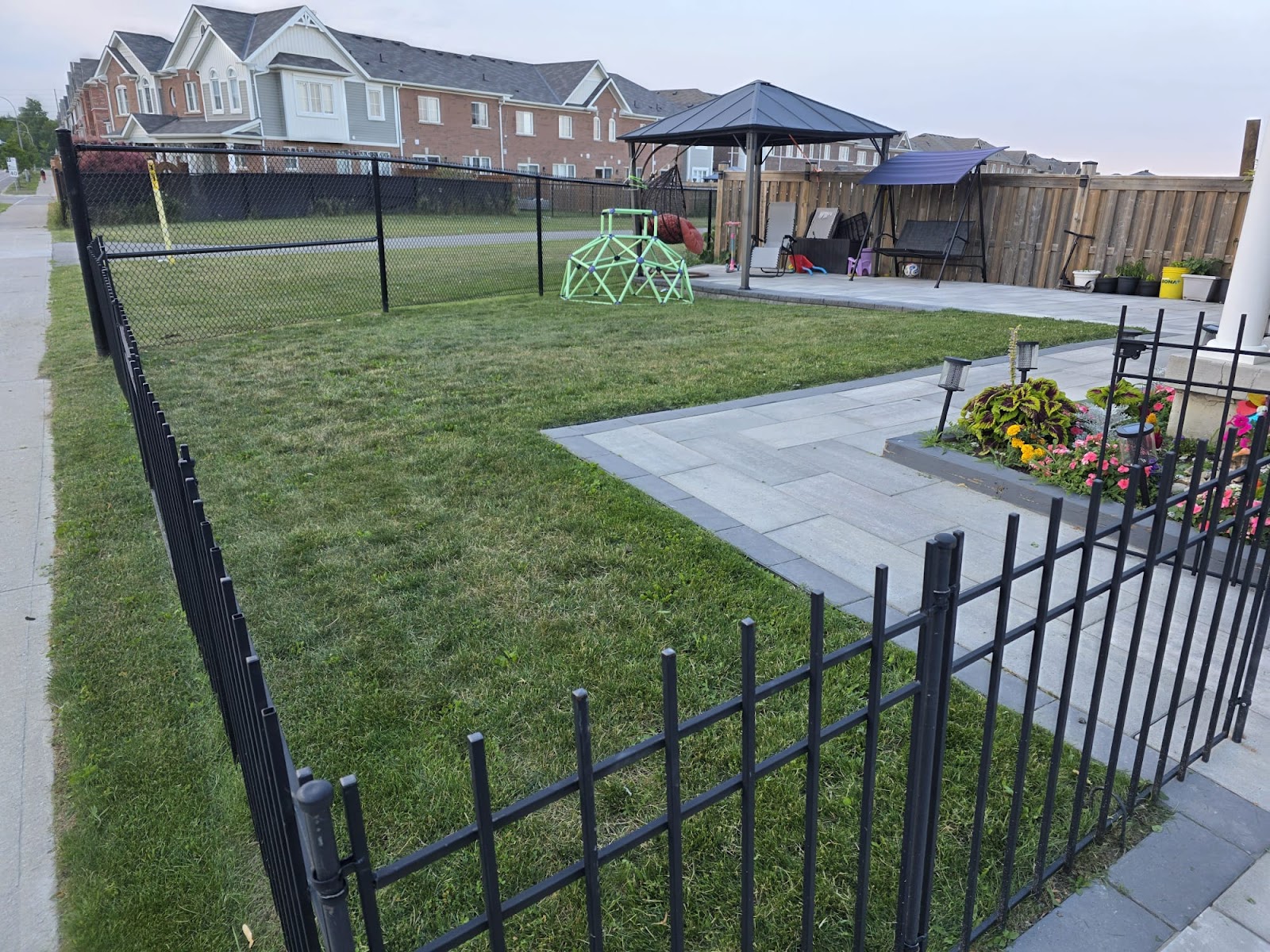 Finished lawn maintenance result in Pickering by Snow and Lawn Brothers